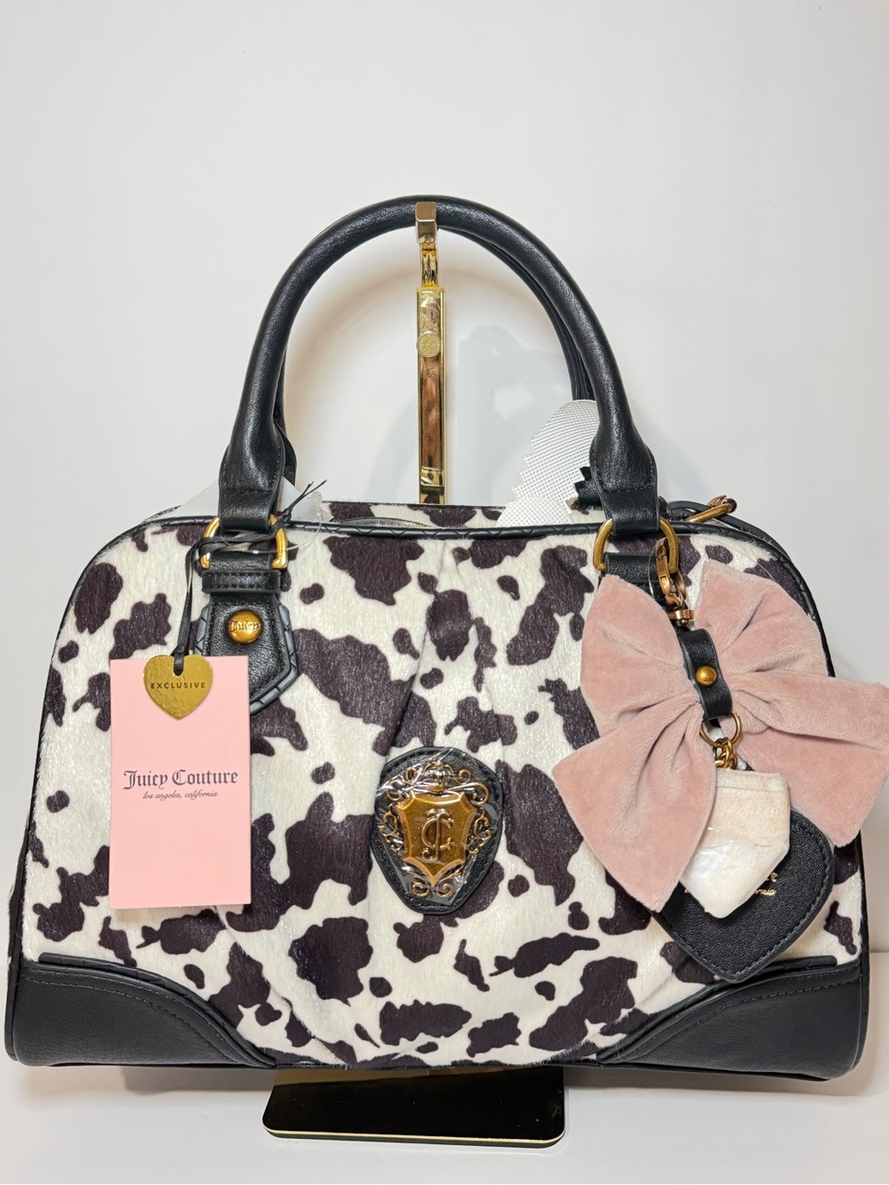 Juicy Couture Black & White Cow Print Satchel with Pink Bow Accent